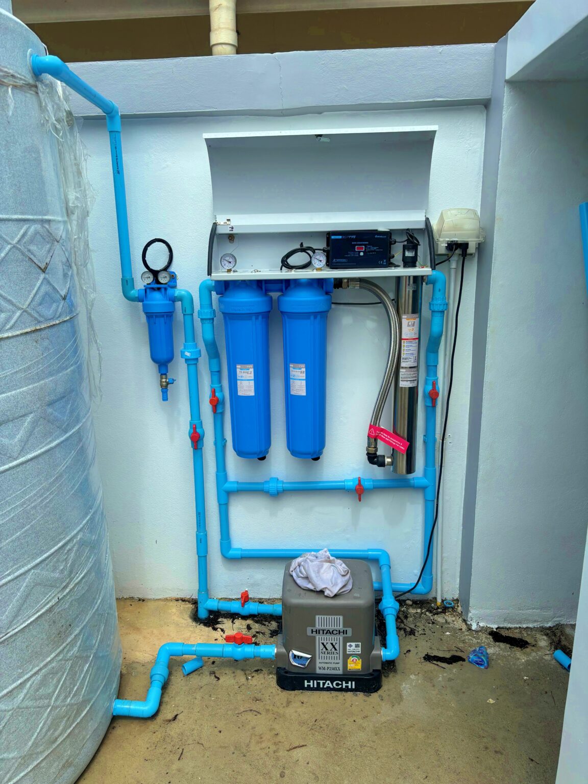 ACES whole-house freshwater filtration system with UV sterilizer and booster pump installation in Pattaya