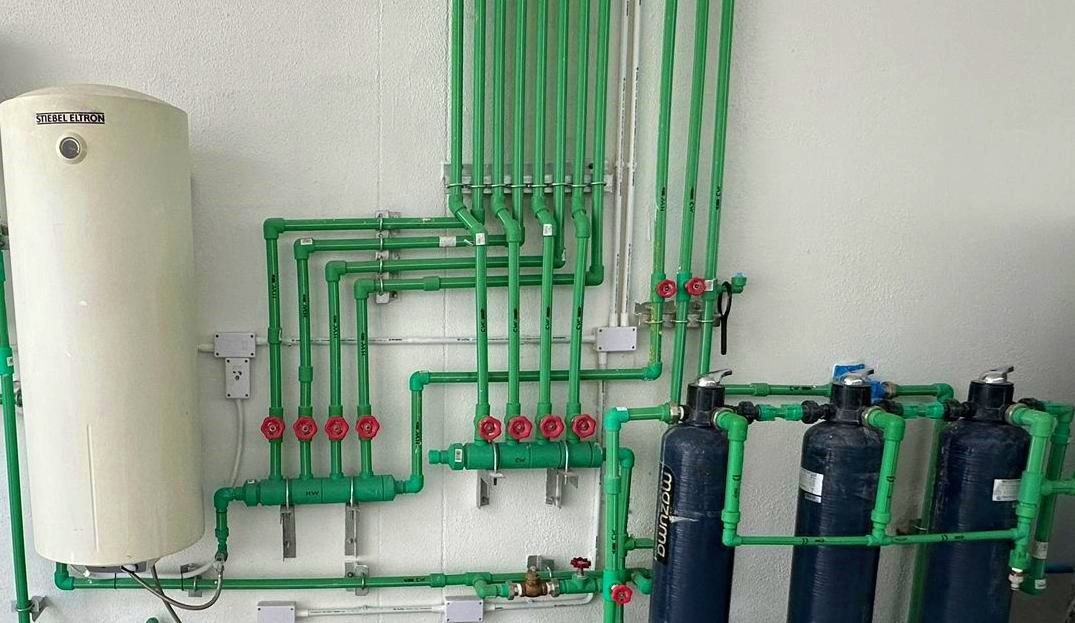 ACES plumbing installation of a whole-house water filtration and hot and cold water heating PPR manifold in Pattaya