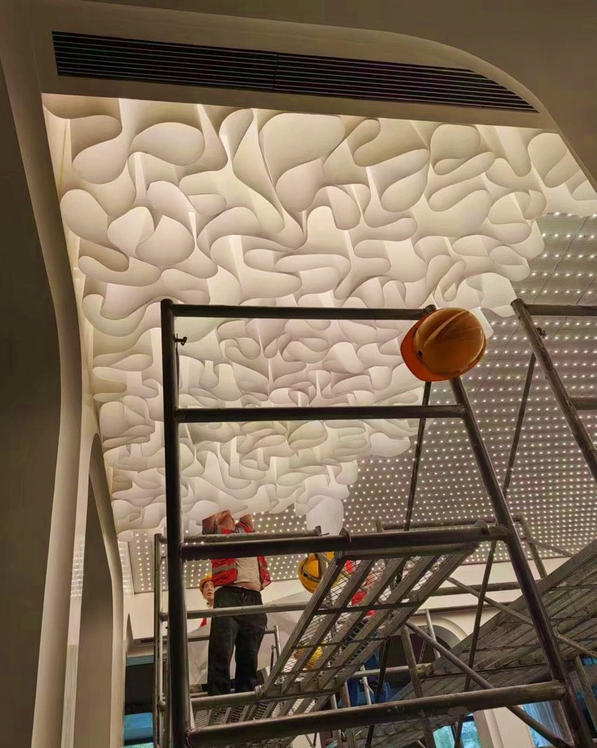 ACES Pattaya technicians installing custom French textured 3D paper ceiling with integrated architectural backlighting