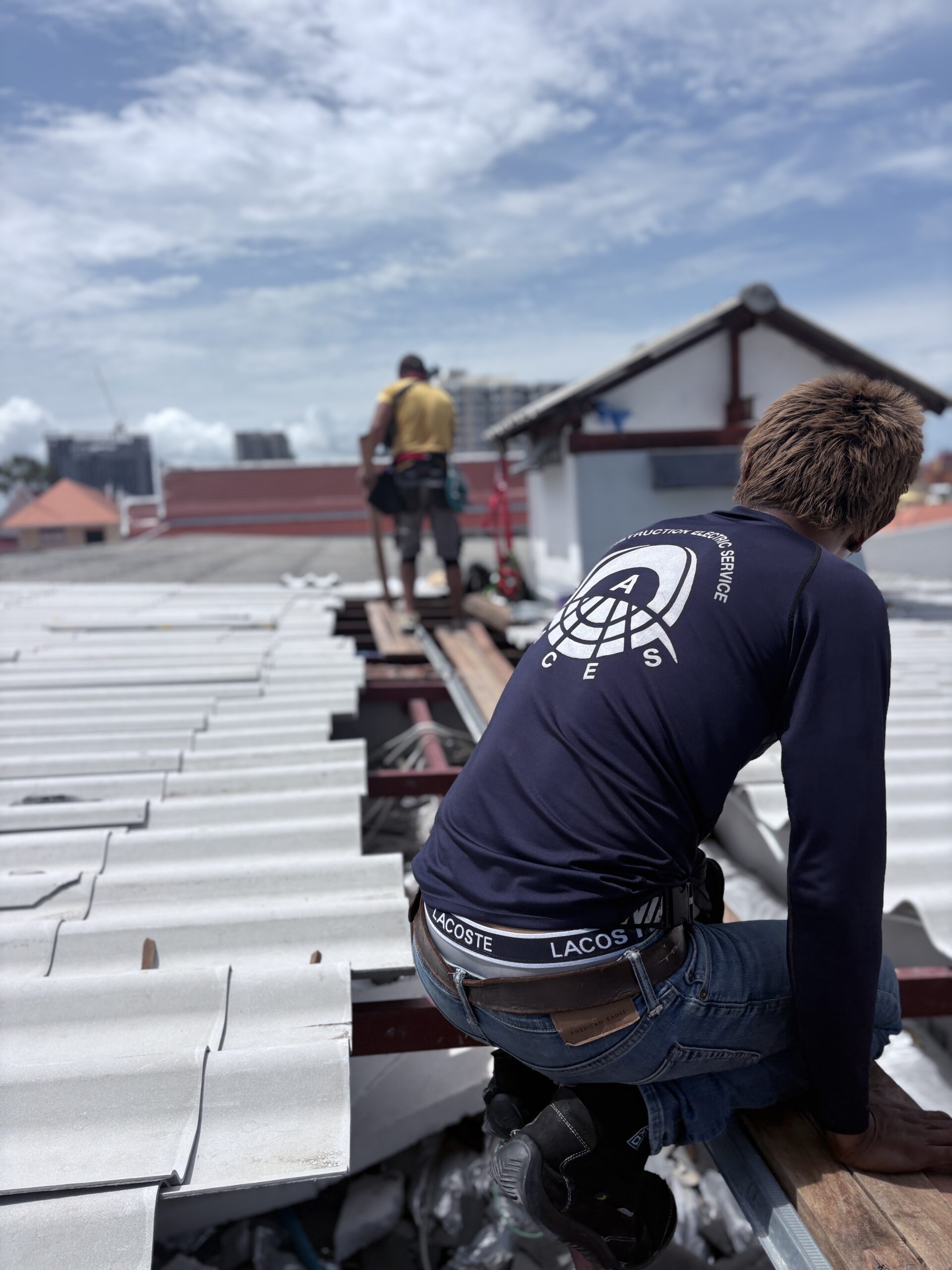 ACES technicians performing commercial property roof replacement and structural maintenance in Pattaya