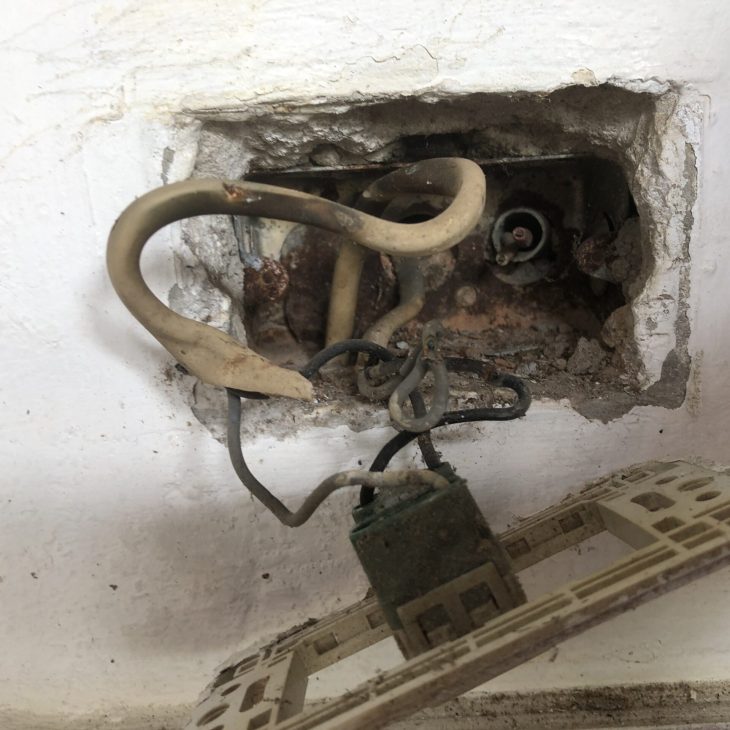 Hazardous corroded electrical socket wiring diagnosed during villa electrical inspection in Pattaya